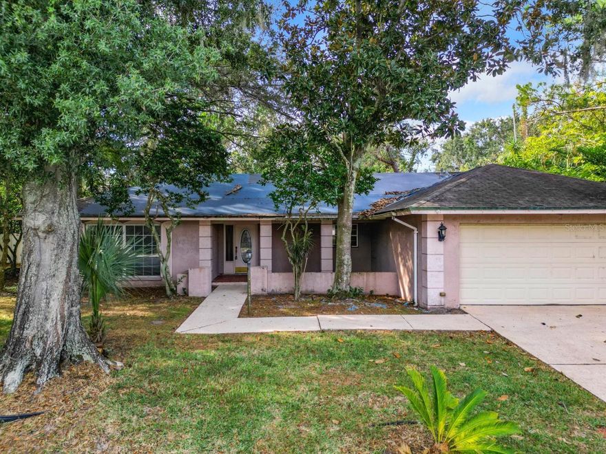 Welcome to your dream home at 8300 Granada Blvd! This stunning 4-bedroom, 2.5-bathroom, POOL home is sure to capture you attention! Situated in the vibrant Bay Lake neighborhood, this property offers an ideal combination of comfort, style, and functionality. As you step through the front door, you'll be greeted by an open, split floor plan that seamlessly connects the living room, dining area, and kitchen. This layout creates a space that is perfect for both entertaining guests and spending quality time with your loved ones, with direct access from the master bedroom to the tranquil screened pool and spa. The natural light that fills the rooms enhances the warm, inviting atmosphere throughout the home and the luxurious wood burning fireplace is sure to delight. The kitchen has been beautifully designed with modern appliances and ample storage space. Whether you're an experienced chef or simply enjoy cooking meals for your family, this kitchen will exceed all your expectations. Outside features a spacious two-car garage and a fenced backyard that offers endless possibilities for relaxation and entertainment. You’ll love being able to unwind and relax poolside in your very own serene outdoor oasis.  This property is located in the highly sought after Dr Phillips area and provides convenient access to everything you need: premium shopping, exquisite dining, golf courses, Disney theme parks, and some of the best schools in Central Florida. You'll experience the finest of both worlds - a serene suburban lifestyle combined with urban conveniences just moments away. Please note these beneficial exterior updates: clean septic report, pool drained and chemically cleaned, and pressure washed all flatwork. Don't miss out on this incredible opportunity to call 8300 Granada Blvd. your home!