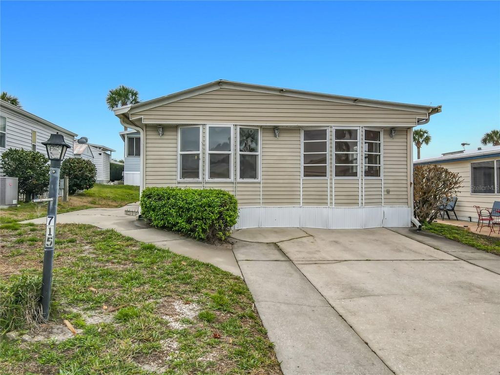 Photo of 9705 Lake Bess Road #715, Winter Haven, FL 33884 (MLS # S5143953)