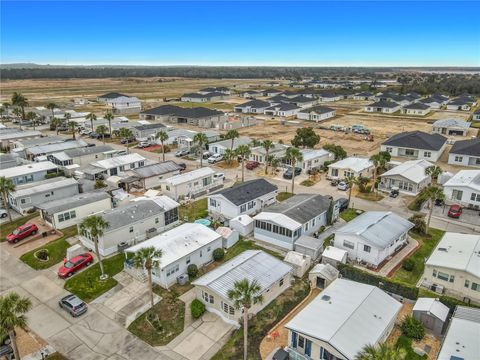 Photo of 9705 Lake Bess Road #715, Winter Haven, FL 33884 (MLS # S5143953)