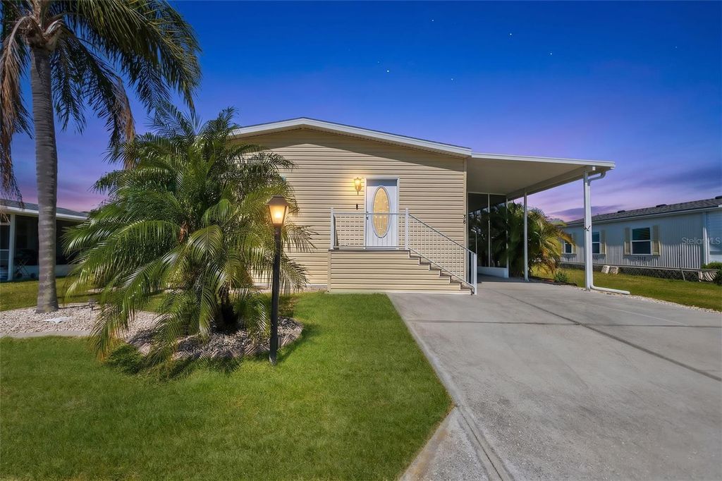 Photo of 530 San Clemente Circle, North Port, FL 34287 (MLS # TB8500605)