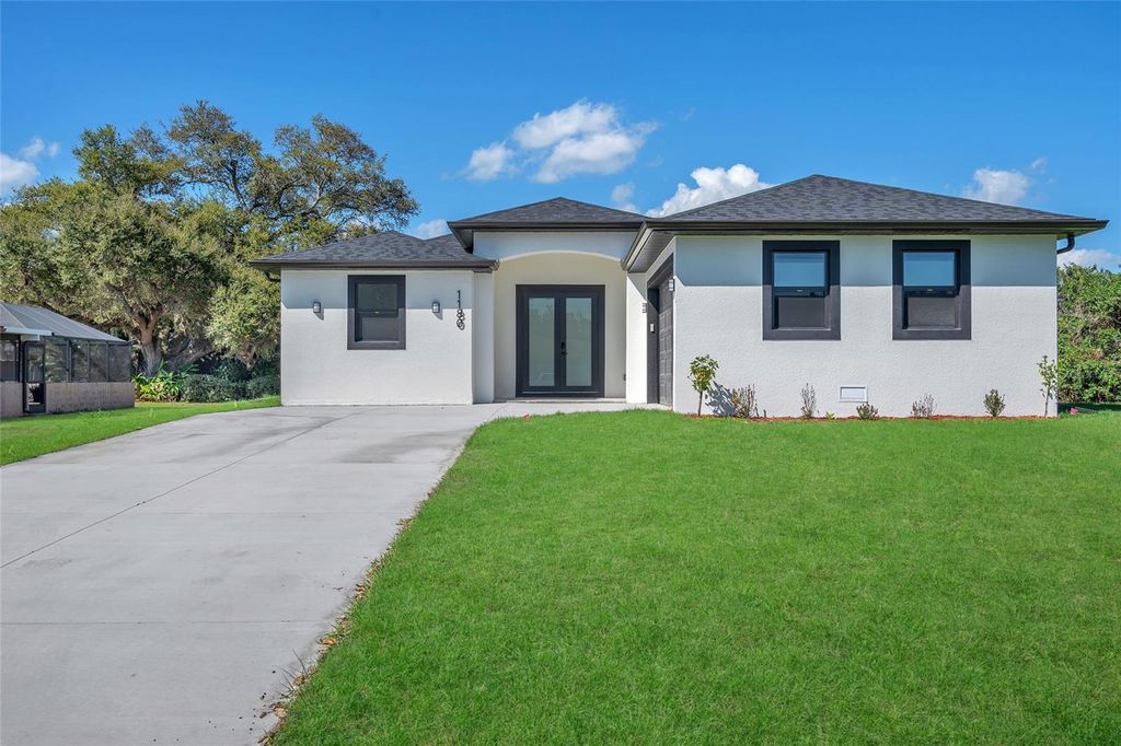 Photo of 1180 Vernon Avenue, Port Charlotte, FL 33948 (MLS # C7525039)