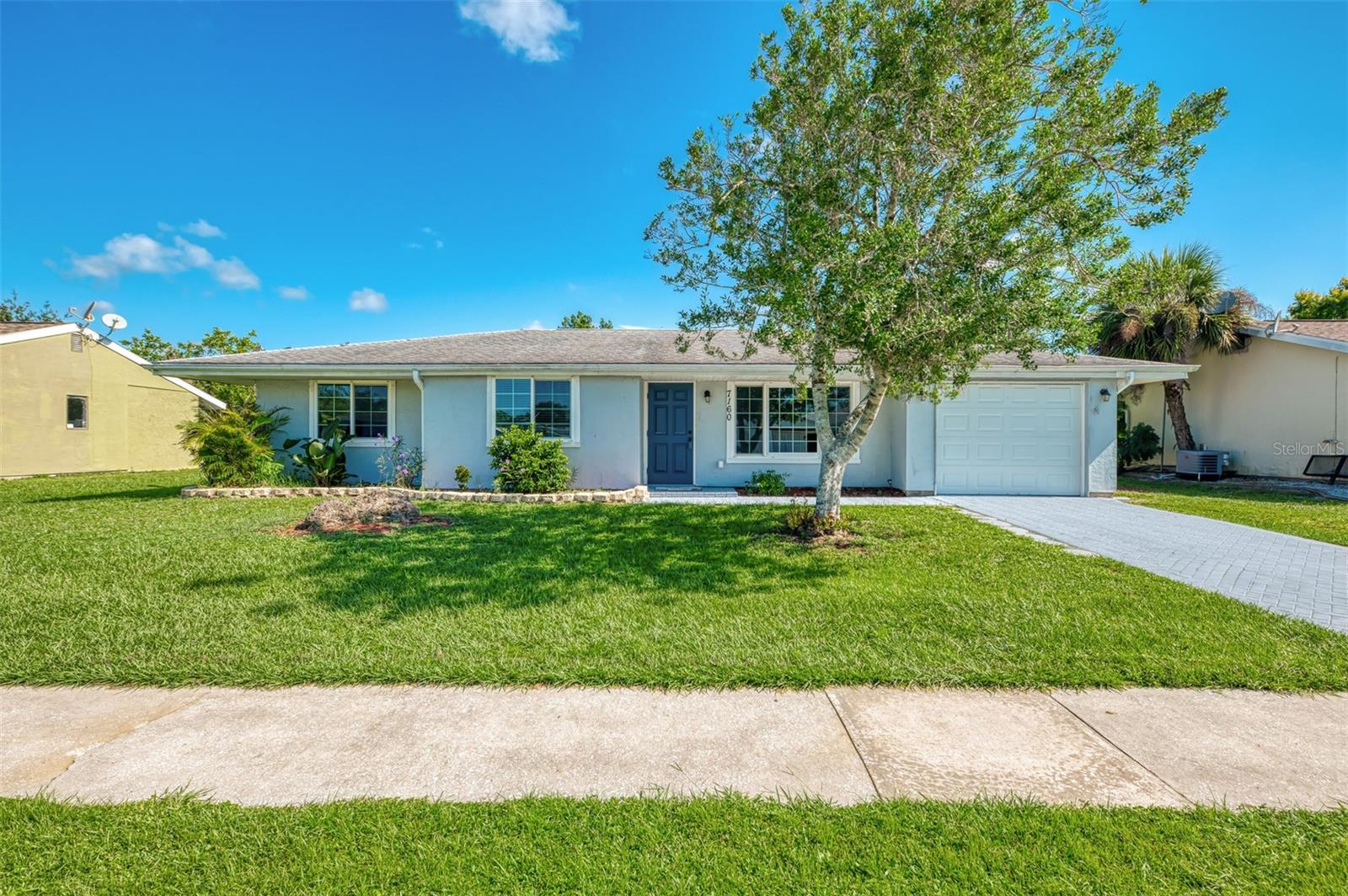 One or more photo(s) has been virtually staged. Charming 3-Bedroom Home with Huge Yard and Great Community Perks in North Port’s Jockey Club! Don’t miss your chance to own this well-kept 3-bedroom, 2-bathroom home in the desirable Jockey Club neighborhood of North Port! This property is full of charm, comfort, and smart upgrades that make everyday living easy and enjoyable. Step inside to a bright and open living space with easy-to-maintain flooring and lots of natural light. The kitchen is both stylish and functional, featuring wood cabinets, a tile backsplash, a lazy Susan, a slide-out trash bin, and even a window that opens to the screened-in lanai—perfect for entertaining. There’s also a second refrigerator included, giving you extra space for food and drinks. The laundry closet comes with a washer and dryer, so you're move-in ready from day one. The spacious screened back porch gives you a great place to relax in the shade while enjoying the fresh air. The large backyard is fully fenced with clean, white vinyl fencing—offering privacy and peace of mind. There’s plenty of space to add a pool, garden, or outdoor kitchen. A storage shed out back adds even more room for your tools and toys. With a paver driveway and fresh landscaping, this home has great curb appeal. The roof is just 11 years old, and the A/C was installed in 2018. You'll also enjoy peace of mind with hurricane impact windows, shutters, and storm-rated garage and front doors. Located on city water and sewer, this home is in a deed-restricted neighborhood with a super low HOA—only $300 per year and no CDD! The Jockey Club offers tons of community perks like a heated pool, tennis courts, basketball, shuffleboard, cornhole, and grilling stations. You're just minutes from Warm Mineral Springs, the Atlanta Braves Spring Training facility, top-rated schools, and great shopping and dining. Plus, you're a short drive from the beautiful Gulf Coast beaches—and this home is not in a flood zone. Homes like this go fast—schedule your showing today!
