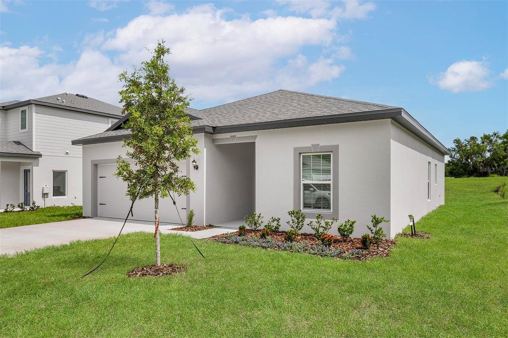 Photo of 13351 Tula Loop, Astatula, FL 34705 (MLS # TB8550902)