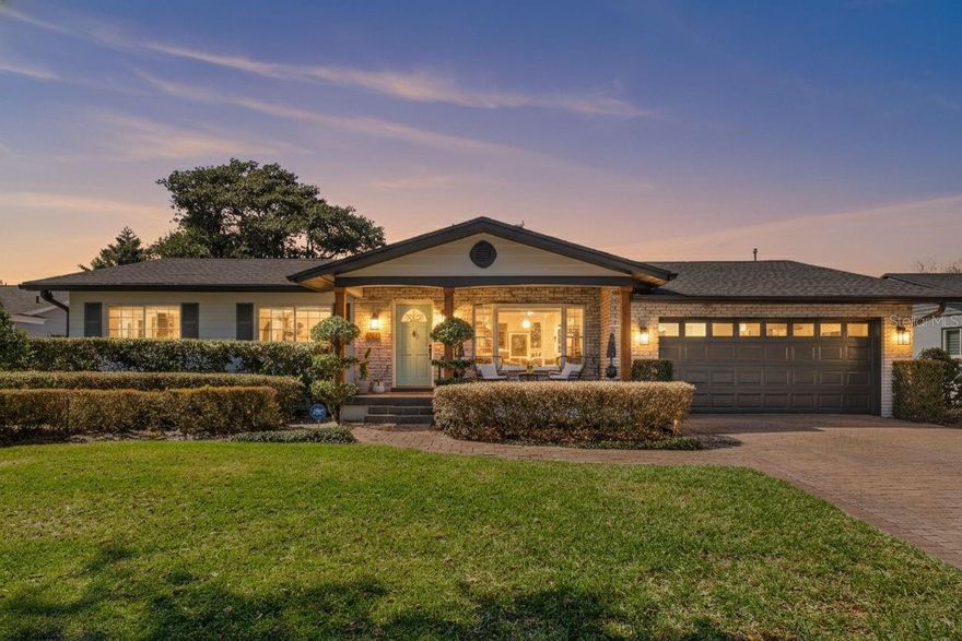 Welcome to this QUAINT AND CHARACTER-FILLED HOME in the heart of Winter Park. As you enter, you’re welcomed by warm ORIGINAL COGNAC HARDWOOD FLOORS that flow throughout the main living areas, setting a timeless and inviting tone.

The home offers a comfortable 3-BEDROOM, 2-BATH floorplan with an easy, functional layout. The living and dining areas feel open yet cozy, ideal for everyday living and entertaining. At the center of the home, the REMODELED KITCHEN blends classic charm with modern functionality and provides a seamless connection to both the indoor living spaces and the backyard.

The bedrooms are thoughtfully positioned to provide privacy and flexibility for family, guests, or a home office, with bathrooms conveniently located nearby.

Step outside to a private outdoor retreat designed for both relaxation and entertaining. The SALTWATER POOL anchors the backyard, complemented by a fully equipped OUTDOOR KITCHEN and BUILT-IN BAR, creating the perfect setting for gatherings. A tranquil POND with a waterfall enhances the peaceful atmosphere and completes the serene outdoor space.

Additional features include a TILED DOUBLE GARAGE WITH EXTRA STORAGE, offering both functionality and convenience, along with a NEWER ROOF and NEWER AC for added peace of mind. This CHARMING WINTER PARK HOME delivers exceptional indoor-outdoor living, timeless character, and a prime location near shopping, dining, parks, and TOP-RATED SCHOOLS.