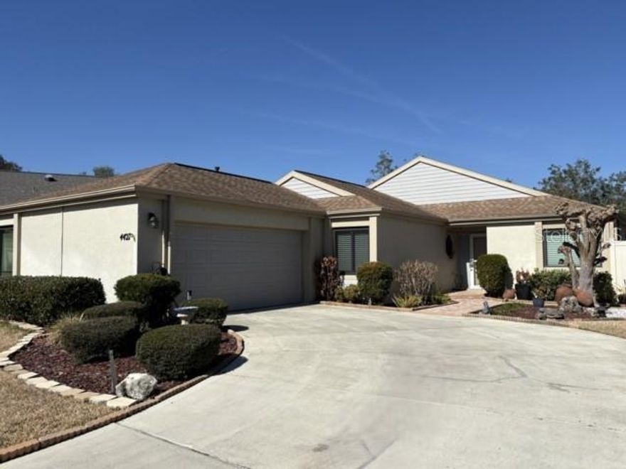 Welcome to this beautiful custom-built home in the sought-after community of Stonewood Villas, a short drive to Downtown Ocala for shopping, dining and entertainment.  This meticulously maintained home was built with enduring quality and timeless craftsmanship plus an elegant and expansive floor plan. The home features 3 bedrooms, 2 full baths, 2 car garage, a split bedroom floor plan with 1,788 square feet living space, vaulted ceilings, beautiful Swarovski crystal chandelier in living room and Thomasville entertainment center, porcelain tile floors throughout for easy maintenance and durability, updated energy efficient windows, an updated eat-in kitchen equipped with wood cabinetry and granite countertops, top of the line stainless steel appliances, glass top range, side by side refrigerator. The primary suite offers lots of light and generous closet space with built-in shelves, a master bath with a jacuzzi and walk-in shower.  Enjoy the serene and peaceful setting of the screened-in back porch overlooking the garden, a true oasis. Upgrades include a new 3.5 tons, 16 Seer Trane HVAC system with cooper pipes and complete air duct replacement in 2025, updated energy efficient Pella windows (4) in 2015, Roof replaced in 2015 with added insulation in 2020.