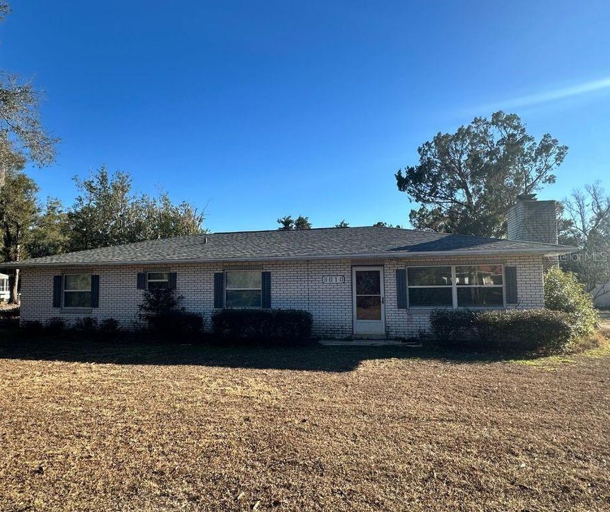 Short Sale. Subject to Lender Approval. Welcome to 3010 NE 98th Ln in the established Cheryl Acres neighborhood of Anthony, FL. Set on a rare double lot totaling nearly a full acre, this property offers space, privacy, and flexibility in a quiet, rural setting.

The home features a functional layout with room to refresh and make it your own. The expansive lot opens the door to outdoor living, future improvements, or simply enjoying the freedom of extra land—something increasingly hard to find. Cheryl Acres is known for its larger parcels and peaceful surroundings, providing a true country feel while remaining within convenient reach of Ocala, Gainesville, and everyday amenities.

A compelling opportunity for buyers seeking land, location, and long-term upside.

Property sold as-is. Third-party approval required.