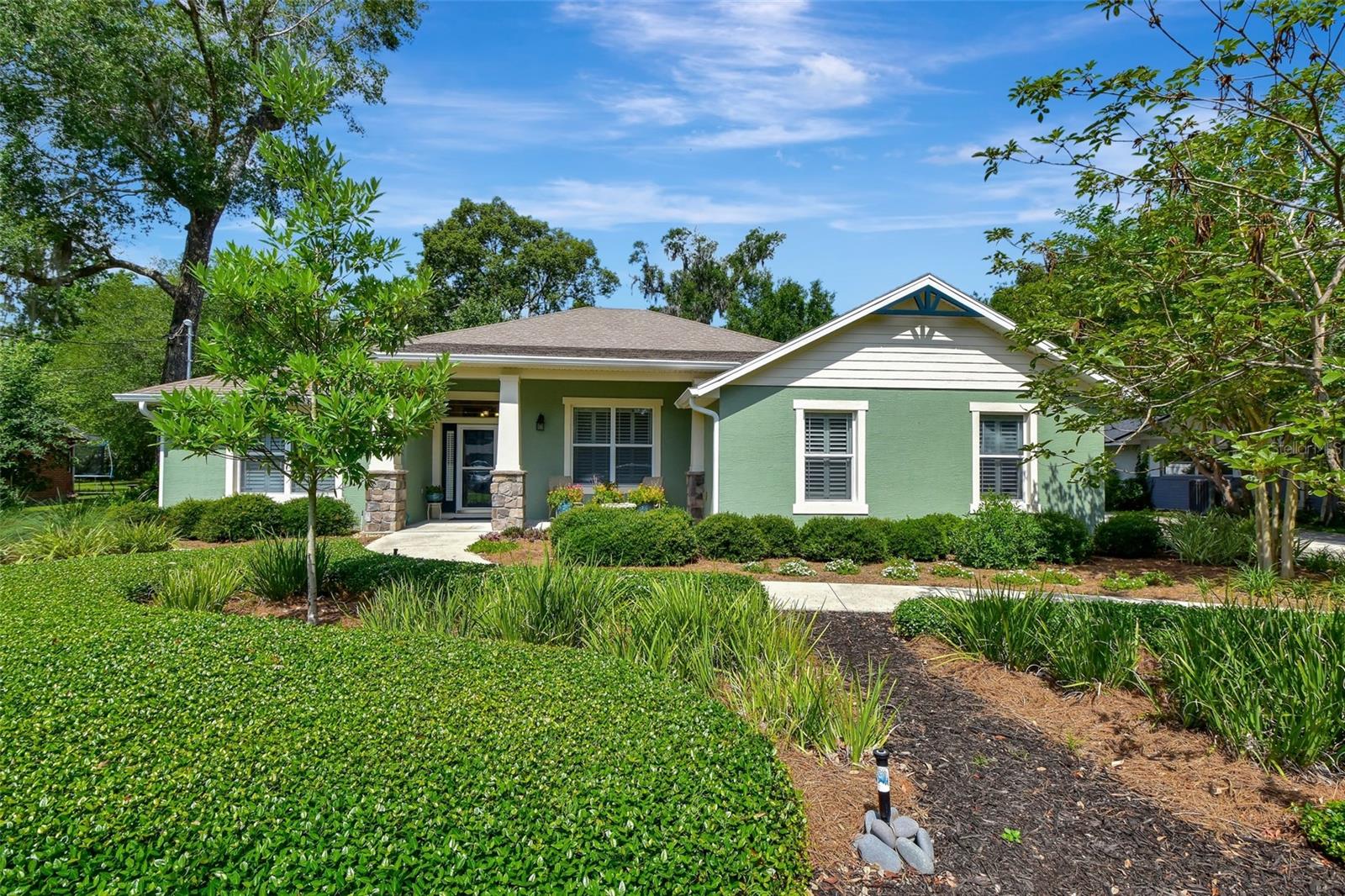 If you have been waiting on the perfect home to come up, this is it. Mr. and Mrs. Clean live here. 2007 Built by Tom Mosco. The entire home has stained concrete floors for easy maintenance and high ceilings to keep it cool. Plantation Shutters for light and privacy. 3BR, +OFFICE, 2BA 2CAR Side Entry Garage. in a very desirable area of Deland. Close to Stetson University and Deland High School. NEW ROOF EARLY AUGUST. Huge Kitchen and Bathrooms Remodel recently by Fogle Constructors. New Kitchen with large Island with Built in shelving for Cookbooks, Seating area, Great Serving area, high End Granite Counters, Sun tunnel for natural light. Black Stainless Appliances (Black Dishwasher) Natural Gas Cooktop, Built in Convection Oven, Built in Microwave Oven. French Door Refrigerator with Ice and Water in the door. Solid wood cabinets with pull outs. Under counter and upper cabinet lighting and tile back splash. Kitchen is open to the Great Room and Dining area. Newer HVAC with heat pump. Natural Gas Tankless hot water heater with circulating pump. Double Pane Windows. Home Office is near the Kitchen with French Pocket door for privacy. Great Room is very open with sliders to the Lanai. Split Bedroom Plan. Master has vaulted ceiling, transom window for privacy and natural light and plantation shutters, walk in closet with custom built in's. Master Bath has linen closet, large vanity with granite counters and double sinks. Large walk in tile shower with bench and dual shower heads. Garden soaker tub, door to the outside for future pool bath or clean up after gardening. 2 Guest Bedrooms are good size, with ceiling fans one has walk in closet. Guest Bath complete remodel with new vanity, granite counters, walk in tile shower with glass wall. Inside Laundry includes the Washer and Dryer (gas) lots of cabinets for storage. Just off the laundry room is the 2 car side entry garage with work bench and peg board to easily hang your tools, utility sink, pull down stairs to the lighted and floored attic for extra storage. Hurricane Brace Garage door with opener and outdoor keypad. Inside the garage is a 50amp plug for generator or electric car, outside is a 50 amp plug for RV, Generator etc. Beautiful landscaping all around. Storage Building in the fenced back yard. Everyone will enjoy the screened Lanai overlooking the very private and beautifully landscaped back yard that has irrigation. When you enter this home, you will know this owner believes in caring for their home. New interior paint 2018, exterior paint 2021.