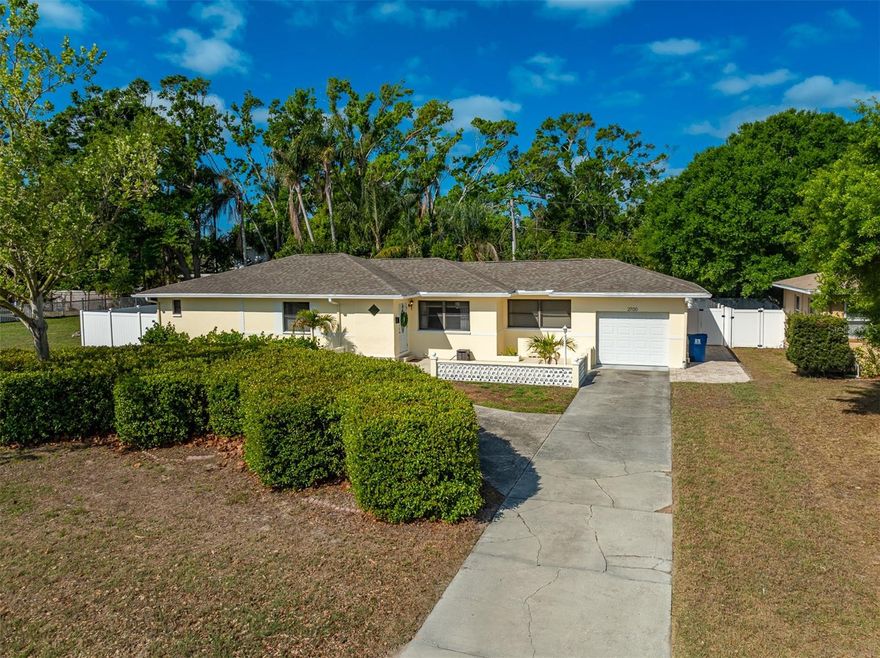 Welcome to this beautifully remodeled single-family home in the desirable Glen Echo neighborhood, located in a top-rated school district with A-rated Tyrone Middle School. Situated on an oversized 90x103 double lot (.21 acres) with no HOA and located in Flood Zone X, this property offers both peace of mind and exceptional space.

This 3-bedroom, 2-bath home with 1,628 square feet and a 1-car garage has been thoughtfully updated throughout. The stunning kitchen features soft-close cabinetry, granite countertops, Samsung appliances, and recessed lighting, with all appliances—including washer and dryer—conveying. High-end waterproof vinyl flooring flows seamlessly throughout the home, complemented by fresh interior and exterior paint, new doors, and updated ceiling fans.

The spacious primary suite offers a large walk-in closet, while both bathrooms have been fully renovated with double vanities, granite countertops, soft-close cabinets, new tile, tubs, fixtures, and lighting. The secondary bathroom also provides direct access to the screened pool area, functioning perfectly as a convenient pool bath.

A large separate dining room offers flexibility for entertaining, additional seating, or extra storage. Step outside to enjoy the screened-in heated pool and expansive lanai, both resurfaced in 2021, creating the perfect private outdoor retreat. The pool has been further enhanced with new pumps and a heat pump installed in 2024.

The fully fenced yard offers exceptional privacy, and the adjacent lot is not buildable—providing added space and peace. A circular driveway allows for easy access and ample parking, while a large concrete slab in the backyard is ideal for storing a boat, RV, or trailer.

Major updates include a roof (2019), A/C (2020), and water heater (2021), making this home truly move-in ready.

This property offers the perfect combination of modern upgrades, functional layout, and outdoor living—ideal for both everyday living and entertaining.