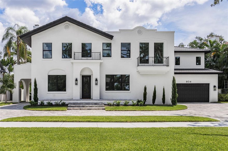 Step into a piece of Tampa history with this stunning original Beach Park Mediterranean estate, impeccably restored between 2023 and 2025 to fuse timeless charm with contemporary sophistication. This grand residence spans an expansive 6,398 square feet and boasts 7 spacious bedrooms, 9 exquisitely designed bathrooms, and a wealth of living spaces crafted for both daily comfort and lavish entertaining.  

The interior captivates with wide-plank white oak flooring flowing seamlessly throughout, complemented by custom white oak cabinetry and paneled appliances in the gourmet kitchen, where a hidden pantry adds a touch of sleek functionality.

Entertain in style with two elegant dining rooms, a cozy den with its own wood burning fireplace, and a sprawling living room awash in natural light with a gas burning fireplace. For the wine enthusiast, a custom wine closet provides the perfect haven to store and showcase your collection.

The first-floor primary suite offers a serene retreat with its own luxurious en-suite bath, find yourself greeted from head to toe by honed iceberg marble. While the second floor boasts an additional primary/guest suite, equally impressive with ample space for visitors or multi-generational living. Every one of the 7 bedrooms enjoys the luxury of a private en-suite bathroom, ensuring comfort and privacy for all. Organization meets opulence with California Closet systems installed in the bedroom closets, offering tailored storage solutions that maximize space and luxury. Convenience shines with laundry rooms thoughtfully placed on both floors of the home.

Outside, a 2-car garage and single-car covered porte-cochère meet the circular roman paver driveway, adding practicality and a touch of grandeur. Located in one of the most established and coveted streets in Beach Park, don't miss your chance to live in this amazing neighborhood where you can walk the tree-lined streets and take in the pleasant waterfront views. This home is just moments from Tampa’s premier dining, shopping, and cultural destinations- also zoned for South Tampa's A-Rated school districts.

A rare chance to own a fully restored historic masterpiece with every modern indulgence—schedule your private tour today!