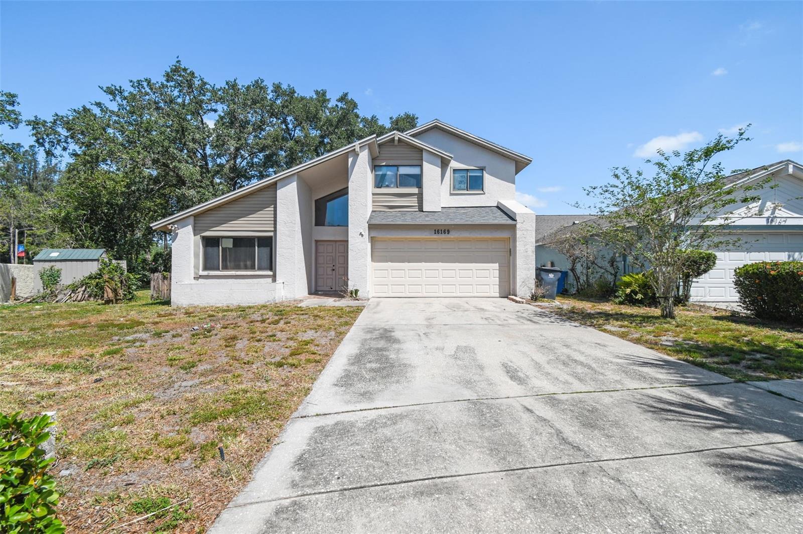 Buyer financing fell through!! Welcome to 16169 Gardendale Dr! This golf course home has had all the big-ticket items taken care of. New Roof: Installed within the last months, providing peace of mind and durability. New Hot Water Tank: within the past 3 years, ensuring reliable hot water. New Luxury Vinyl Plank Flooring: Stylish and easy-to-maintain flooring throughout the house.
The home features 4 bedrooms and 3 full baths, offering ample room for family and guests. The kitchen has been updated and the house sits on a corner lot, providing additional privacy and space.
With some fresh paint and a little love, this house could easily become your new home. Its great Tampa location is close to restaurants, shopping, downtown, and beaches, making it convenient for all your needs.