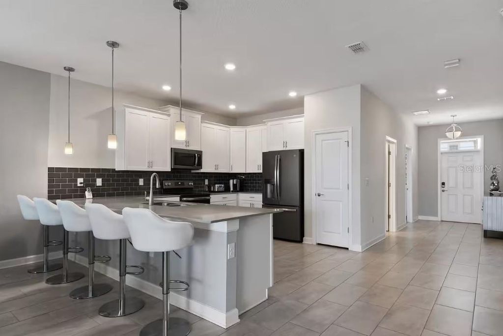 Photo of 1545 Maidstone Court, Davenport, FL 33896 (MLS # O6371401)