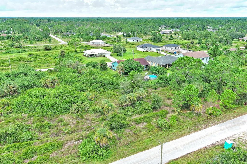 Photo of 928 Norfolk Avenue S, Lehigh Acres, FL 33974 (MLS # O6344062)