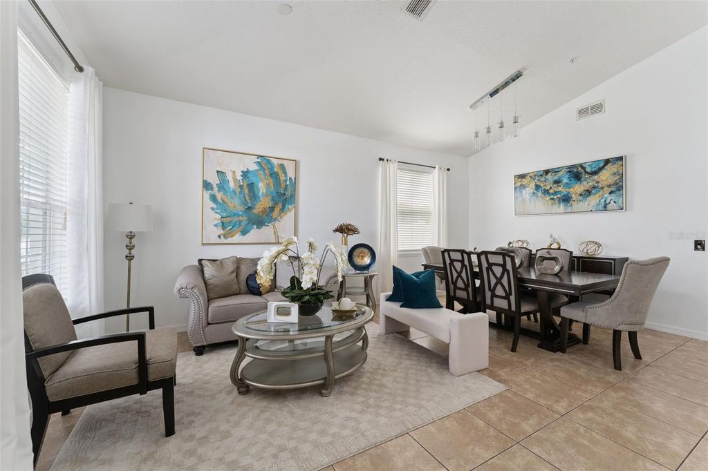 Photo of 10484 Eastpark Lake Drive, Orlando, FL 32832 (MLS # O6391114)