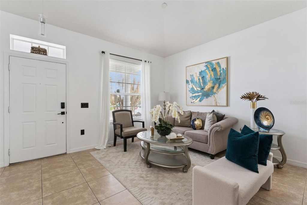 Photo of 10484 Eastpark Lake Drive, Orlando, FL 32832 (MLS # O6391114)