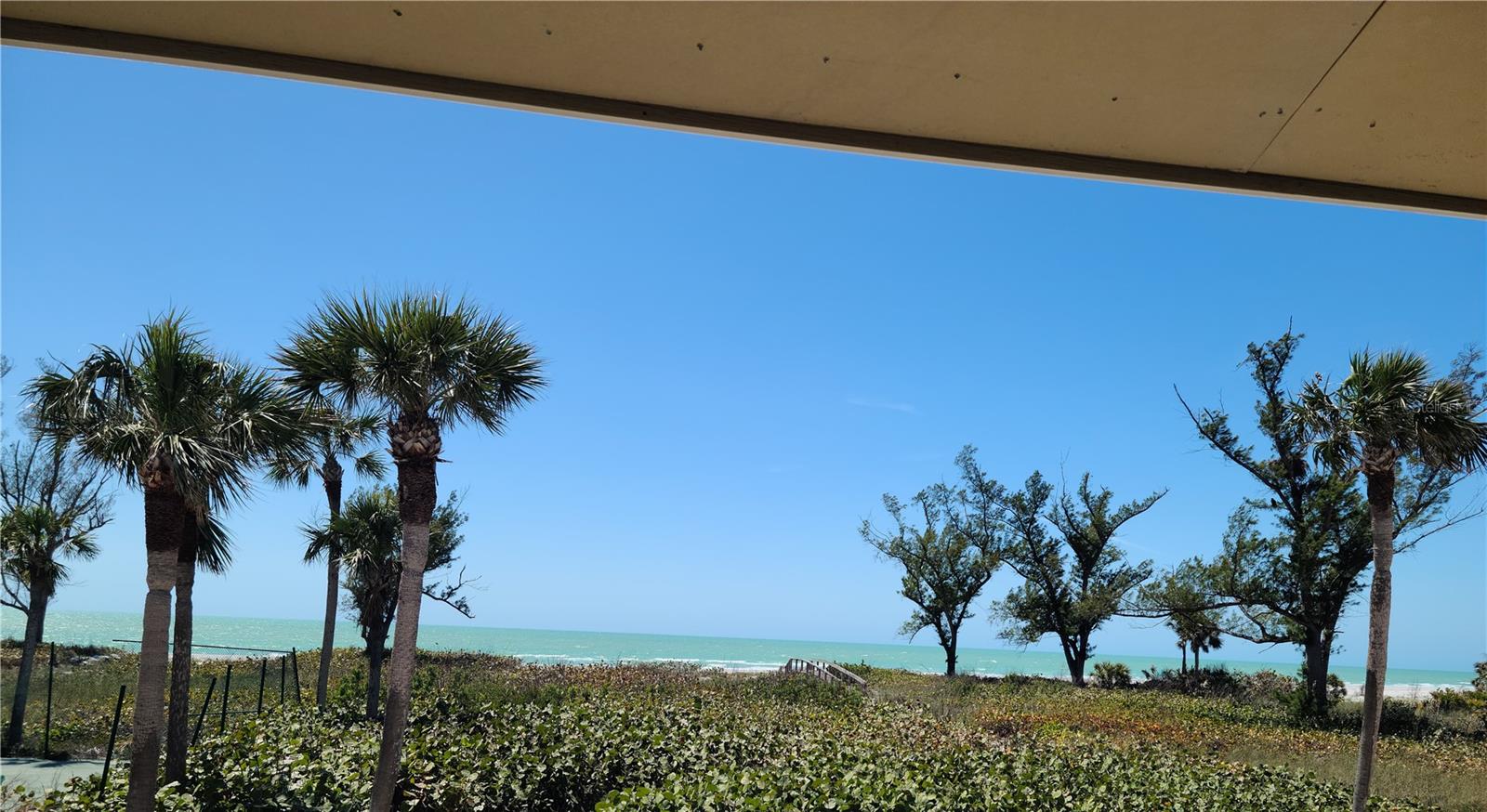 Exceptional opportunity to live gulf front and create this home to your special desires! Enjoy majestic sunsets, the aqua waters and beautiful beach. This home has an elevator that services all 3 floors from garage. The property is under reconstruction and estimated completion is end of 2025. This property is being sold "AS IS" at this time.