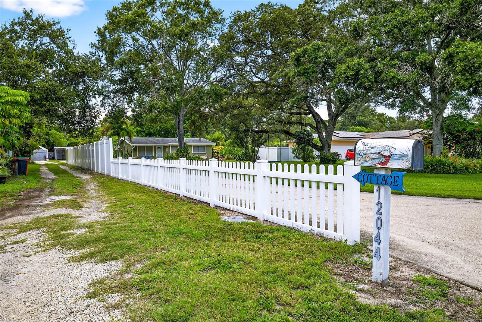 Charming 2-Bedroom Coastal Cottage just 10 minutes from the powdery sands of Indian Rocks Beach! Situated on a spacious .28-acre lot, this home offers an extended driveway with attached carport and inviting outdoor living spaces, including a private patio, fire pit, and hot tub. Inside, enjoy a light-filled living area that opens seamlessly to the kitchen. Two storage sheds provide plenty of room to stay organized. Recent updates include a brand-new water heater and a roof replaced in 2016. With a strong short-term rental history and endless potential, this property is ideal as a vacation retreat, investment opportunity, or your very own coastal oasis. Don’t miss the chance to own a piece of paradise in one of the area’s most desirable locations!