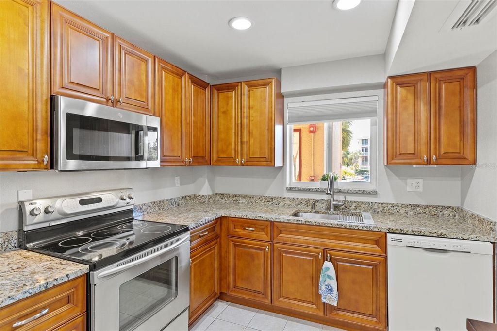 Photo of 3873 Lake Bayshore Drive #201, Bradenton, FL 34205 (MLS # A4678474)