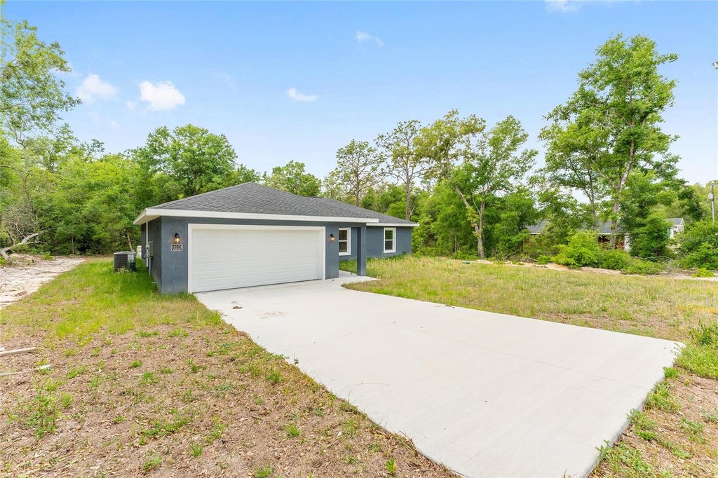Photo of 10374 SE 126th Lane, Belleview, FL 34420 (MLS # OM733504)