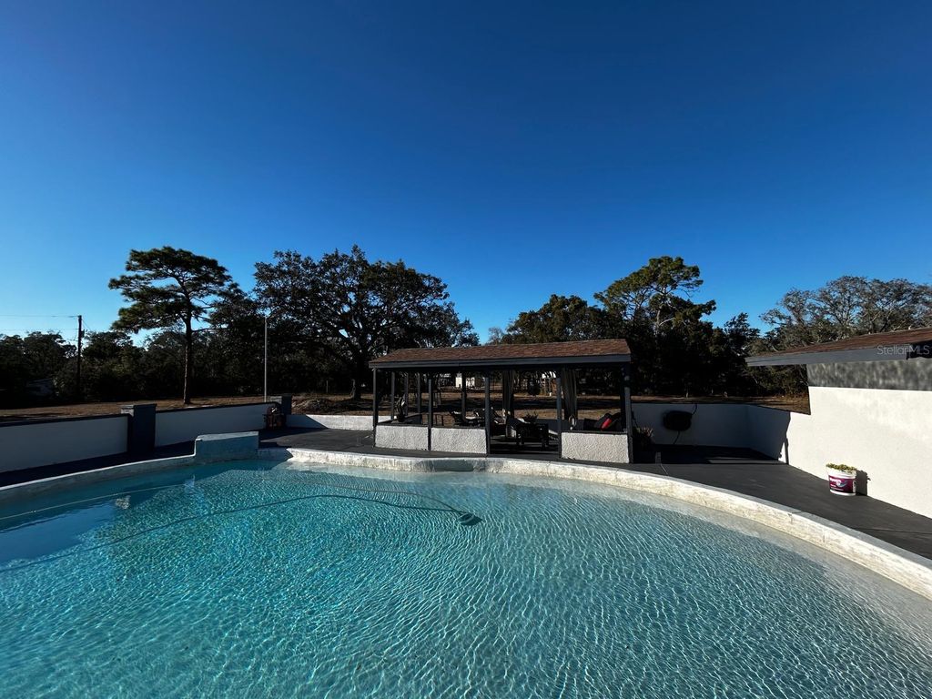 Photo of 16225 Whippoorwill Lane, Spring Hill, FL 34610 (MLS # TB8492758)