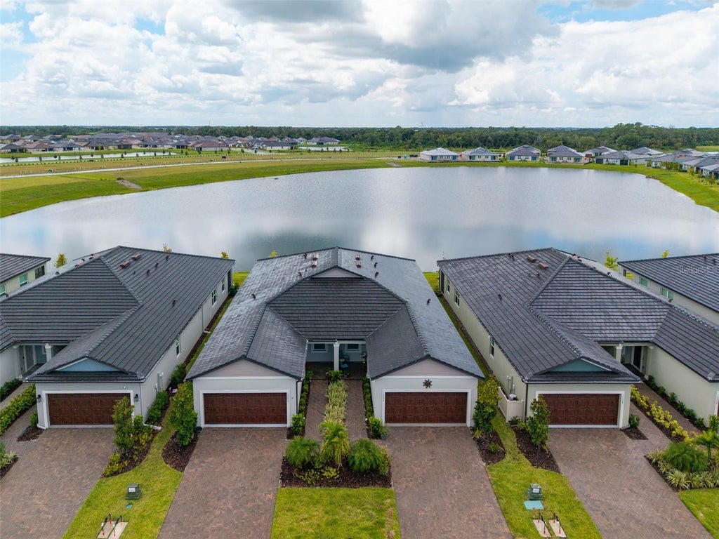 Photo of 12592 Lily Quartz Loop, Parrish, FL 34219 (MLS # TB8541864)