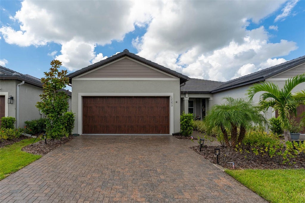 Photo of 12592 Lily Quartz Loop, Parrish, FL 34219 (MLS # TB8541864)