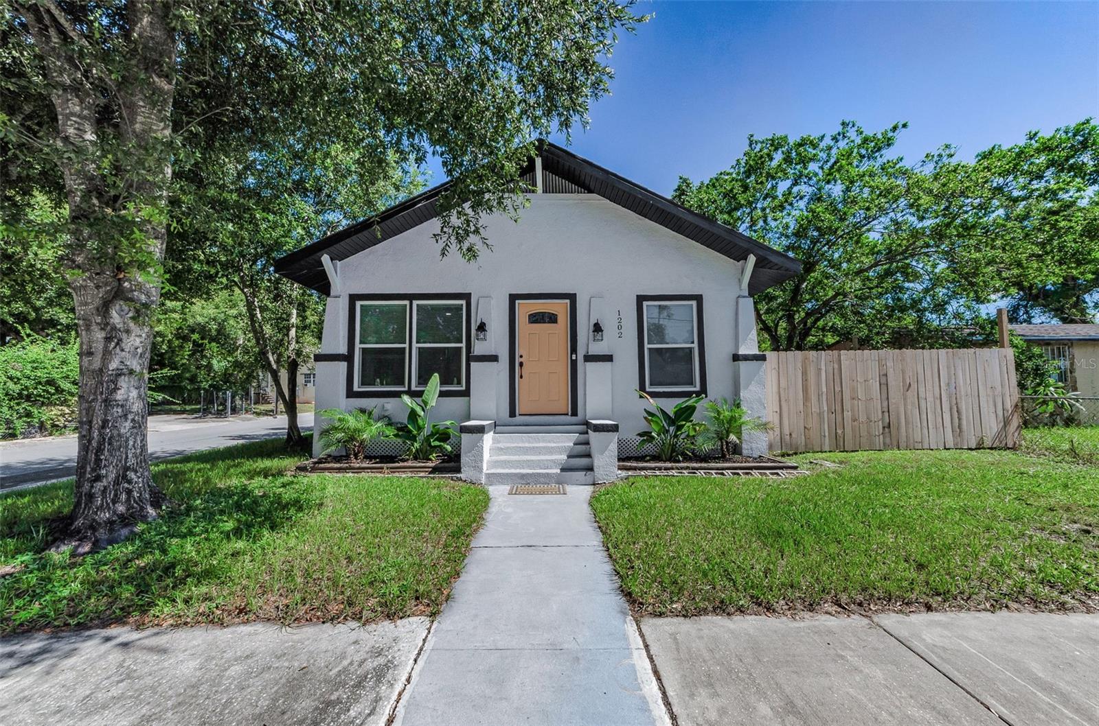 Looking for a move in ready home for a fabulous price CLOSE TO EVERYTHING! The wait is over! This amazing 3 bedroom home offers a newer roof and new ac - kitchens, bathrooms and flooring all redone plus a fenced in yard and large side entry detached garage. This home is minutes to downtown Tampa, channelside, Riverfront area, Hyde Park and so much more ~ all areas perfect for eating, shopping, entertainment and more. At this great price, don't take a chance missing out! Call for an easy showing today!