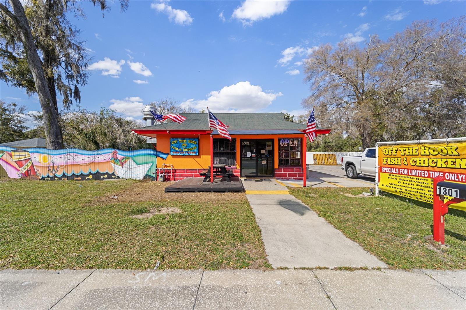 This prime commercial corner to corner property is ideally positioned at the busy intersection of on NW 10th St.(Hwy 27) - benefiting from a high traffic count of more than 20,000 vehicles daily! Excellent location to expand with a drive through behind the building between 13th & 14th Avenue with frontage on Hwy 27 (NW 10th St)The space is currently being operated as "Off The Hook Fish & Chicken" take out restaurant. Listing includes two parcels totaling 0.40 acres and B-4 zoning, it offers a great opportunity for investors or business owners looking to establish a presence in a thriving area. There's plenty of room to expand if you choose so the possibilities are endless - from restaurant to retail and everything in between. Price includes the business and the property. Check attachments for zoning info and restaurant equipment included with sale.