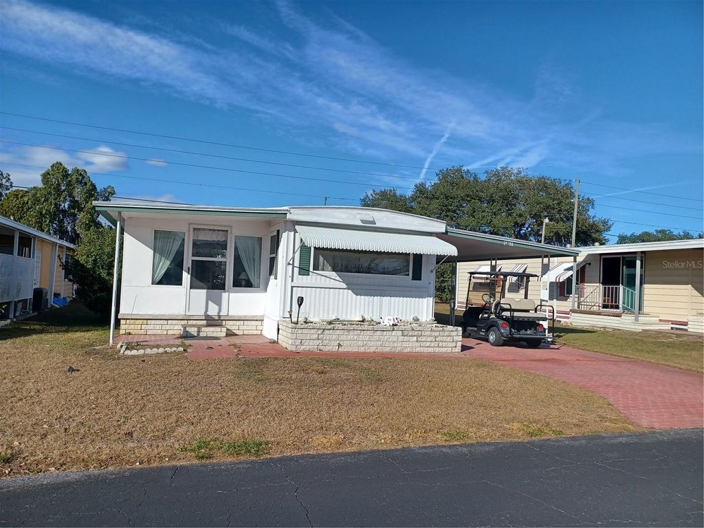 Photo of 34701 Rosebud Row, Zephyrhills, FL 33541 (MLS # TB8471013)