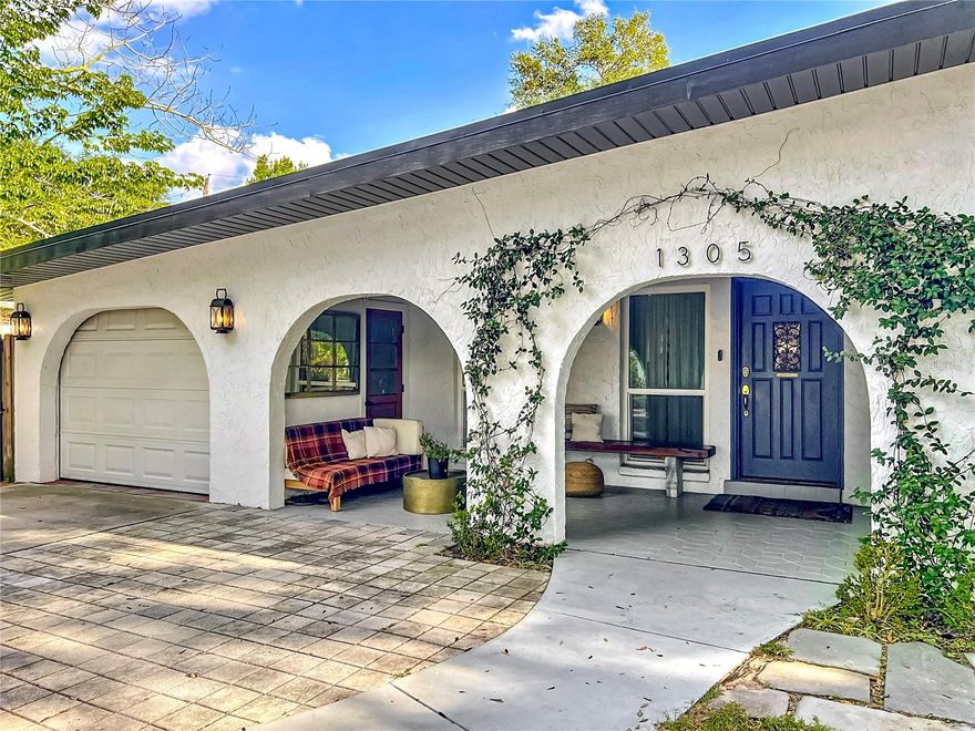 A rare opportunity to own a beautifully renovated home in one of Orlando’s most sought-after neighborhoods (on one of the most secluded streets!) —Audubon Park. This home is the true definition of pride of ownership. The sellers spent years thoughtfully cultivating and renovating every inch from top to bottom.
From the second you enter beyond the two mature oak trees & charming porch, you’re immediately greeted by elevated ceilings, stunning exposed wood beams, incredible porcelain wood floors and abundant natural light. The open-concept layout flows seamlessly from the living area into the fully renovated kitchen, featuring top-of-the-line appliances, quartz countertops with generous counter space, cabinets galore and fantastic dual sinks. Just off the primary bedroom, a charming office/book nook provides the perfect retreat. The swanky primary suite is a true sanctuary- from the custom built entry doors, to a rustic, farmhouse feel, this airy and light filled space is perfection. The split floor plan offers privacy for guests or family, with each secondary room showcasing thoughtful details—warm woodwork, unique ceiling treatments, sealed concrete flooring and beautiful custom closet doors. The abundant yard features a spacious paver-patio, shaded and equipped with delicate lighting, plenty of yard space for gatherings, pups, a pool, or a peaceful retreat. 
Every inch of this home has been lovingly designed, and no detail was overlooked—even the essentials. Major upgrades include a brand-new metal roof (2024), updated plumbing and electrical, new AC system (2022), window replacement in 2020 & spray foam insulation in attic.
Located 1/2 mile to the highly rated Audubon Park K-8, just seconds away from East End Market, Leu Gardens, the most amazing locally owned shops and restaurants, the location cannot be beat! 
This gem is truly one of a kind—a home you don’t want to miss!