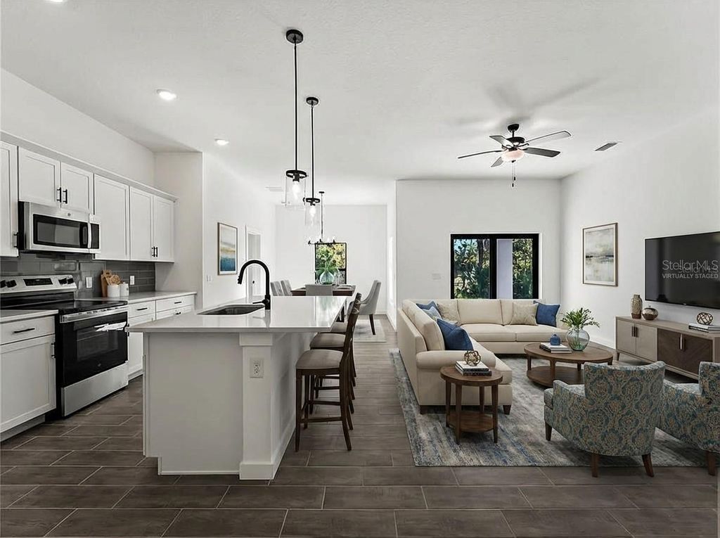 Photo of 3085 Stockton Avenue, North Port, FL 34286 (MLS # C7520061)