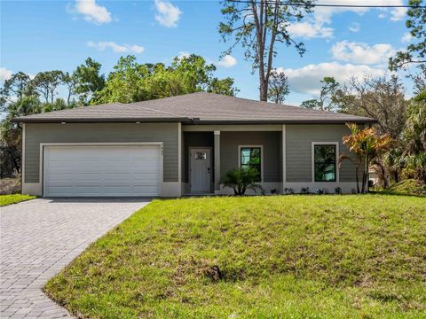 Photo of 3085 Stockton Avenue, North Port, FL 34286 (MLS # C7520061)