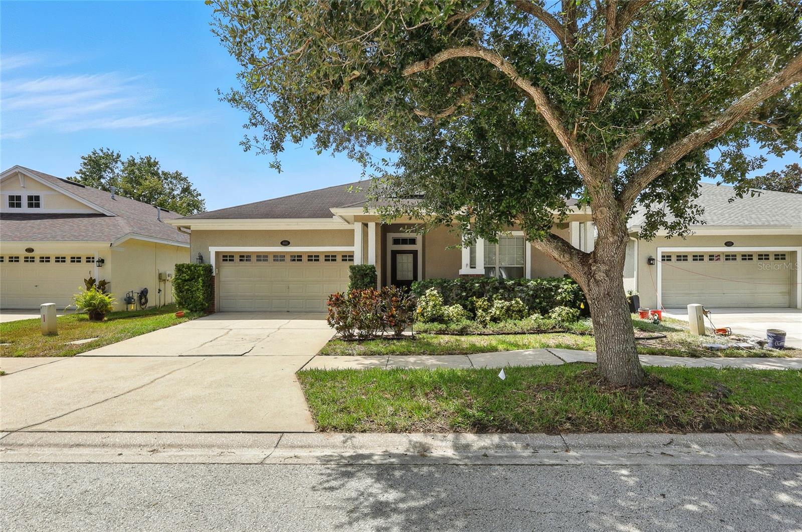 Welcome to 18112 Fall Creek Dr, Lutz, FL – a beautiful Craftsman-style home brimming with character and modern farmhouse charm. Within the STEINBRENNER school
district Inside, you’ll find warm and inviting large living spaces enhanced with shiplap accent walls, wood-look tile flooring in the kitchen, and stylish details that create a cozy
yet refined feel. The open-concept kitchen features granite countertops, a walk-in pantry, gas range, and a breakfast bar that flows seamlessly into the living and dining
areas—perfect for both entertaining and everyday living. The primary suite is a serene retreat, featuring tray ceilings, a spa-like bath with dual vanities, soaking tub, and
walk-in shower—plus private access to the pool and patio, making morning coffee or evening swims just steps away. A large office offers incredible flexibility and could easily
be converted into a spacious 4th bedroom to fit your family’s needs. Step outside to your backyard oasis: a sparkling saltwater pool with sun shelf, and pavered deck—all
surrounded by a privacy fence for relaxing and entertaining in style. Additional peace of mind comes with a brand-new roof to be installed before closing, ensuring years of
worry-free living. Located in the welcoming Reflections community, this home also comes with the perks of a low HOA and no CDD fees, plus access to community
amenities. Add in the highly rated schools and convenient location near the Veterans Expressway, shopping, dining, and more, and you’ve found the perfect balance of
comfort and convenience. Whether you’re working from home, enjoying poolside weekends, or hosting friends and family, this Lutz gem is ready to welcome you.