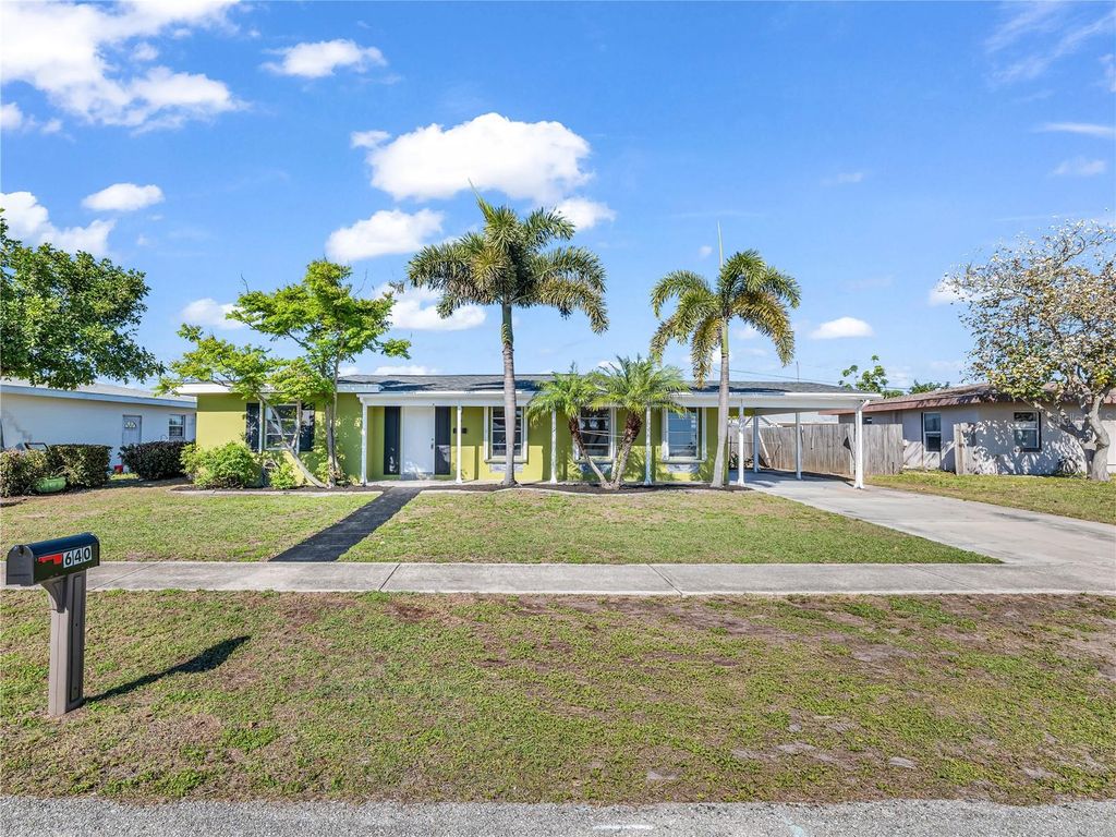 Photo of 640 Dalton Boulevard, Port Charlotte, FL 33952 (MLS # O6394789)