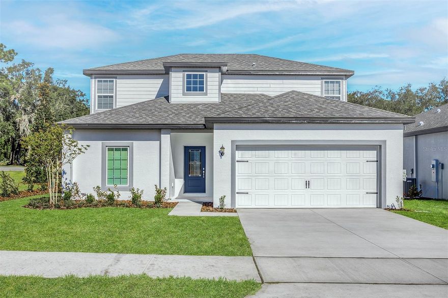 Reduced Price! Welcome to the Useppa model in the sought-after Tula Parc community of Astatula! This impressive 5-bedroom, 2.5-bathroom, two-story home offers exceptional curb appeal, modern upgrades, and plenty of space for comfortable living.

Step inside to an open-concept main floor featuring a spacious family room, a chef-ready kitchen, and a separate den for additional flexibility. The kitchen is a true standout, equipped with energy-efficient Whirlpool® appliances, sprawling granite countertops, designer wood cabinets with crown molding, recessed lighting, and luxury vinyl plank flooring throughout.

Upstairs, the home continues to impress with a flex room and a game room, perfect for entertainment or relaxation. The stunning master retreat offers a private escape with plenty of space, abundant natural light, and a well-appointed en-suite bathroom. The remaining four bedrooms provide ample room for family and guests, all with generous storage options.

Enjoy the convenience of modern smart-home features, including a programmable thermostat and a Wi-Fi-enabled garage door opener. The mature landscaping in the front yard enhances the home’s welcoming charm.

Located in the brand-new community of Tula Parc, residents enjoy access to a community gazebo and playground, along with nearby Little Lake Harris, where boating, fishing, and kayaking await. With nature reserves, golf courses, and Orlando’s world-class attractions, shopping, and dining just a short drive away, this home offers the best of both relaxation and adventure.

Don’t miss your chance to own this stunning Useppa model—schedule your tour today!