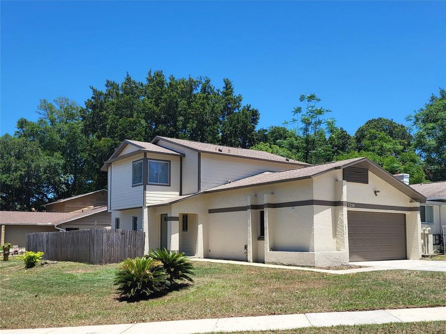 Recently renovated and immaculate-this 3 bedroom/2.5 bath home will knock your socks off! Tons of natural light stream in through the abundance of windows. Upgrades include high end flooring throughout (no carpet!), shaker style kitchen cabinets, granite countertops, stainless steel appliances-and the bathrooms have been updated as well. Storage is a breeze with the oversized two car garage and landing alcove by the front door. The fenced backyard and patio are perfect for enjoying the Florida weather. No HOA and a super convenient location-the one has it all!