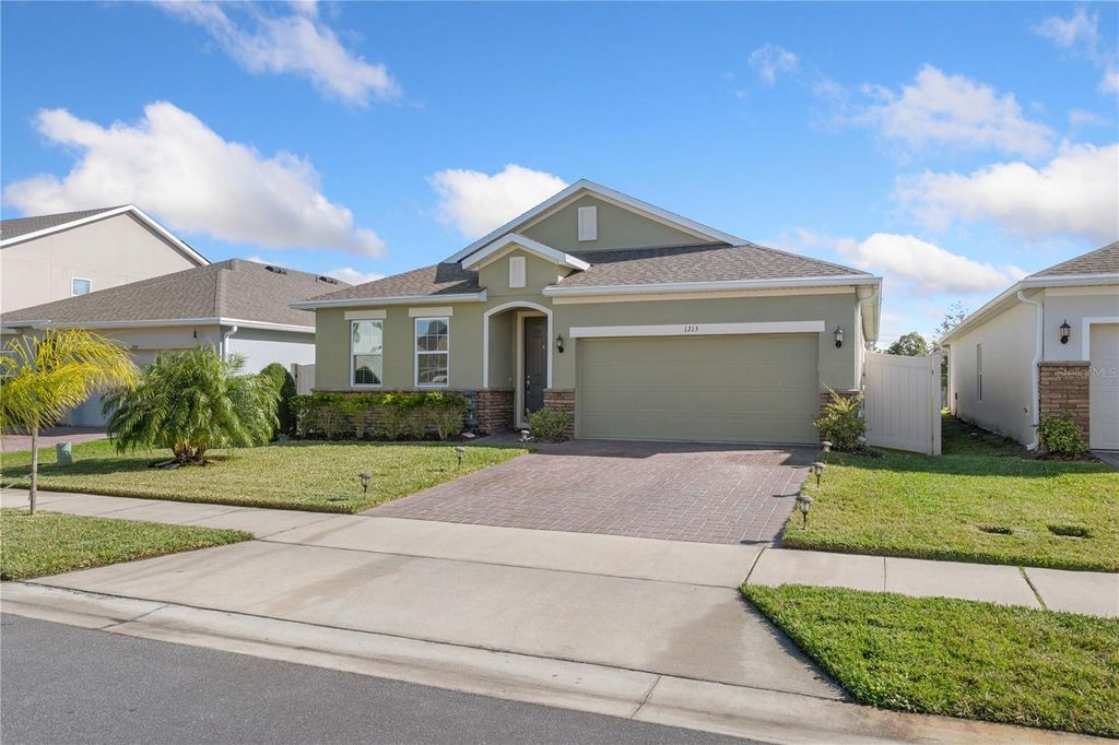 Photo of 1213 Crane Talon Way, Sanford, FL 32771 (MLS # S5142361)