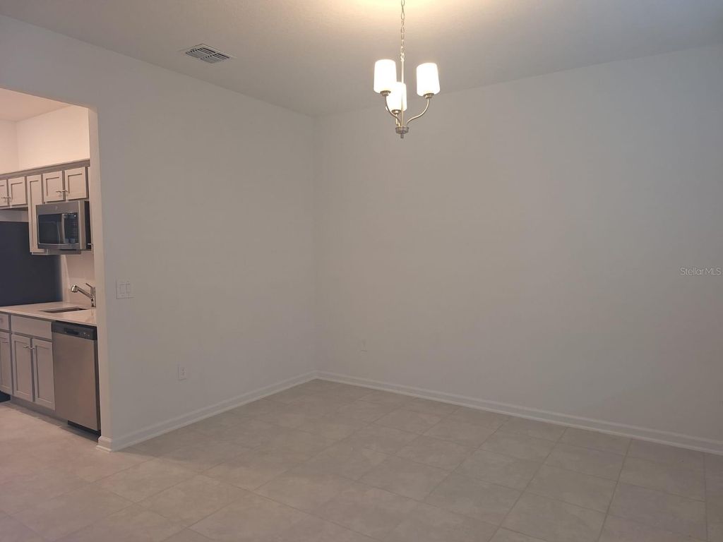 Photo of 3999 Ambrose Avenue #B, Kissimmee, FL 34746 (MLS # O6376351)