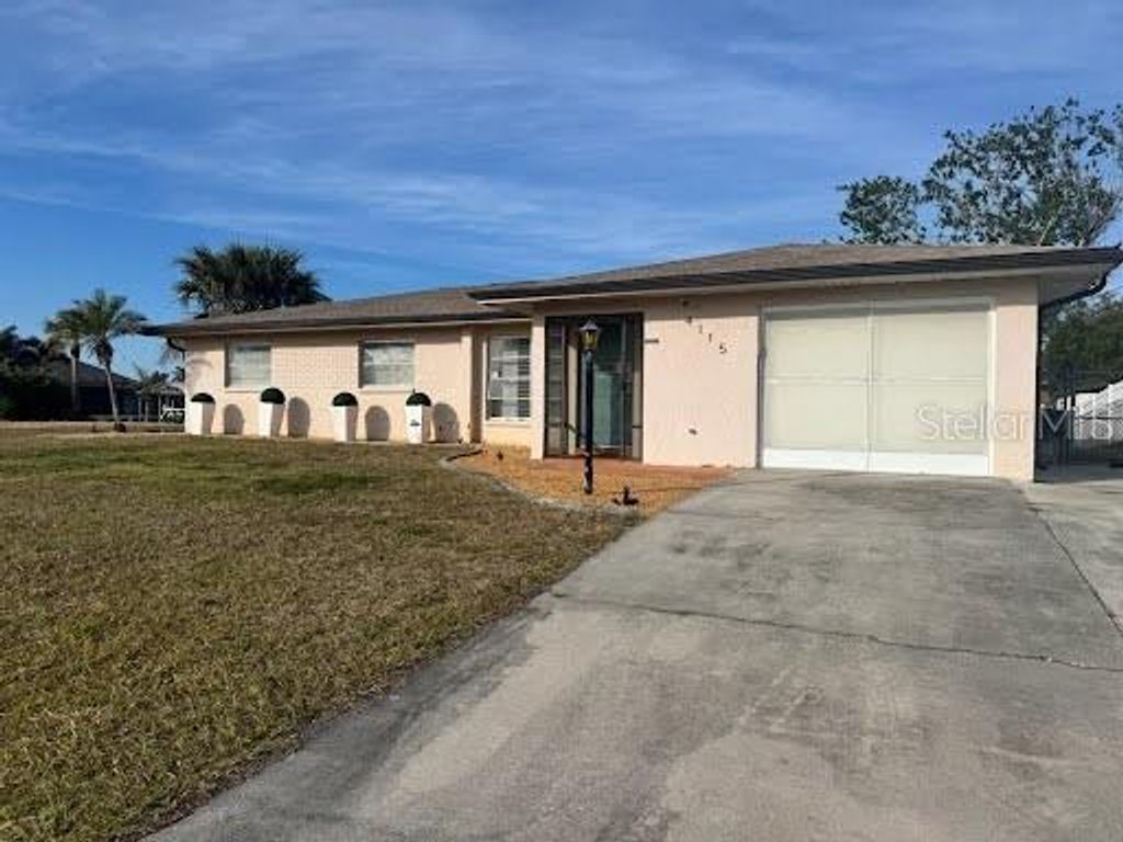 Photo of 4115 Corn Street, Port Charlotte, FL 33948 (MLS # W7875514)