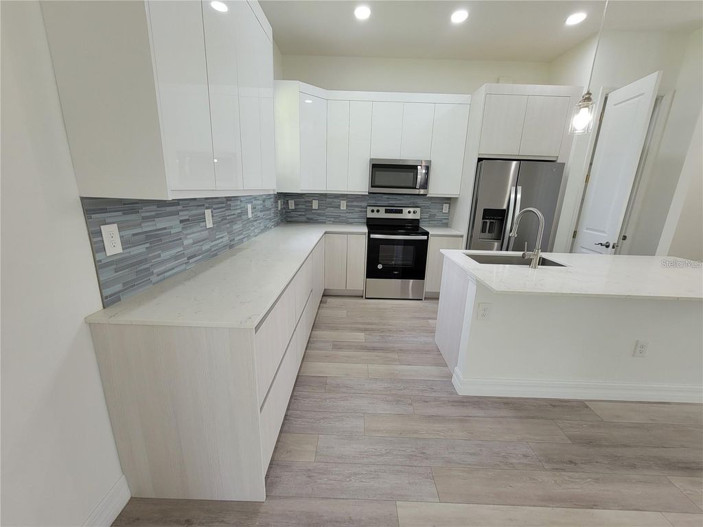 Photo of 2721 Parasol Lane, North Port, FL 34286 (MLS # A4661592)