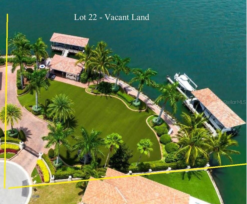 This walled-in, gated lot is on a tip of a Westshore finger surrounded by Open Bay and Lagoon water views. This is part of a large Estate and is 22,320 SqFt with an address of 5140 Longfellow and can be purchased separately from the home at $7,900,000. This lot already has the basic infrastructure completed with a surrounding seawall and rip rap and the following: an entertaining dock with an outdoor, covered patio and a separate fire pit with a seating area facing Open Bay, a brick paved walking path along the water, a second dock for yacht slip protection on the Lagoon waterfront portion of the lot. The Open Bay can also be seen from this dockage area on the east side of the property. There is ample green space to construct your own dream home.
This lot is the best open bay and protected Lagoon area in town because of all the infrastructure that is already in place.
Since Lot 22 is also part of an Estate with a large existing home on it, the home can also be purchased for a land total of 36,800 SqFt for an additional $9,500,000. In the existing home, the Ground Level with amenities and storage has a total of 4,888 SqFt which is the existing breakaway area and opens to the pool and outdoor entertainment area. The home also has a gym & chef’s kitchen The second and third living levels of the three-story home have 9,232 SqFt of living area. See the listing attached for the existing home at 5138 Longfellow (MLS #: T3395887).
The property is minutes away from the interstate, Crosstown, International Mall, and private and public airports, churches, and schools. It is 20 minutes to St. Pete beaches and 45 minutes to Clearwater and Belleair beaches, and 1 hour and 30 minutes to Disney.