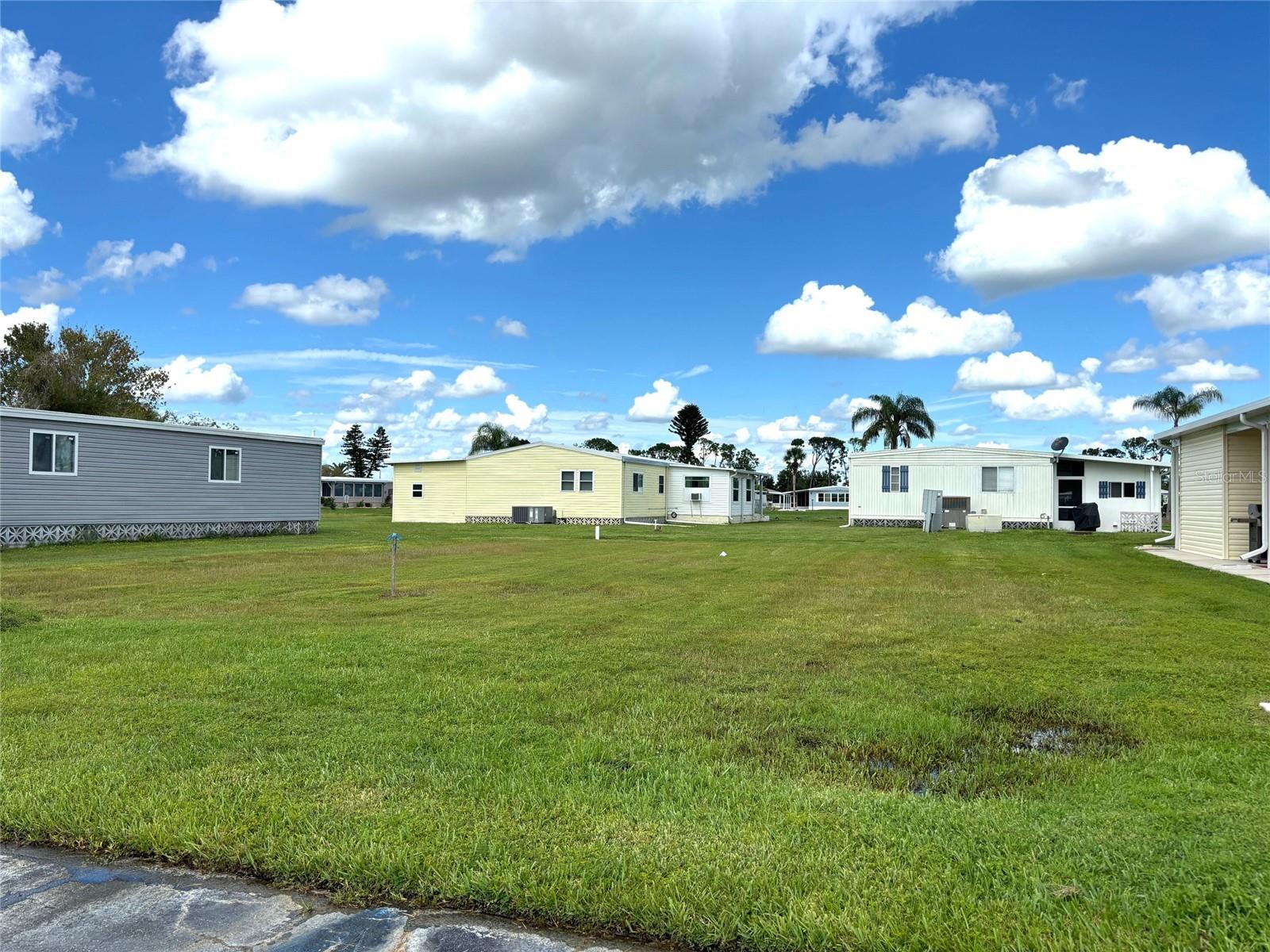 Vacant lot in a vibrant 55+ community! La Casa offers the ultimate Florida lifestyle. We have 974 homes nestled among a variety of native trees with spacious common grounds surrounding our eight lakes. Located between Sarasota and Fort Myers, this is a boater's dream with access to the Gulf of Mexico. It is convenient for shopping, sightseeing, golfing, fishing, and boating, as well as all the culture and elegance the Southwest Florida area is noted for. La Casa may have the best pools in the area. Our crown jewel is an extremely large, 40 X 60-foot swimming pool that is kept at a perfect 87 degrees. Our smaller 20 x 40 pool is quietly nestled between the clubhouse and the Activity Building. Both pools have adjacent hot tubs which are ideal for soaking muscles that are tired from golfing or tennis. Wireless Internet (Wi-Fi) is available at the Clubhouse, Activity Building, and Recreation Hall area where these pools & spas are located, so you can catch some rays while you catch up on your email! Sound enticing? Come for a visit to this self-contained oasis and see for yourself why La Casa is the ultimate destination for both snowbirds and year-round residents!