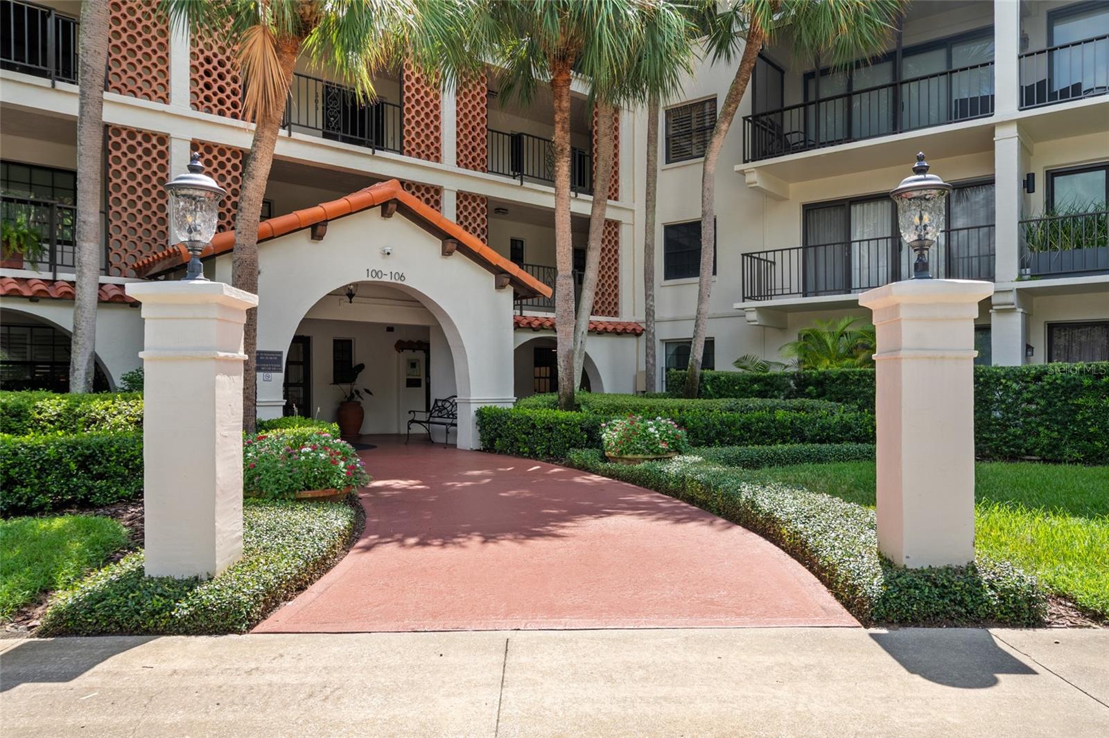 Welcome to the Cloisters, an exclusive lakefront condominium community in Winter Park, now available for lease. This first-floor two-bedroom, two-bath residence offers a thoughtfully updated open-concept layout and direct garden access. Entering from the main hallway, you step into a welcoming interior where the kitchen sits to the right, featuring a breakfast bar that connects seamlessly to the dining and living areas. The open living space extends into a versatile sunroom, ideal as an office, library, or den, with a ceiling fan and sliding doors leading out to the gardens and pool. To the left of the entrance, a hallway leads to the private quarters. The hall bath, first on the left, includes a tub-shower combination and single vanity. The second bedroom, which can also function as a home office, offers dual access from the hallway and the living area and features plantation shutters, as well as built-in closet. At the end of the hall, the primary bedroom offers garden views and a walk-through closet that leads to the en-suite bath; appointed with a spacious single vanity, ample storage and a walk-in shower. The closet also includes a full-size stacked washer and dryer for convenience. Residents enjoy a host of amenities including a lakefront clubhouse, heated pool, fitness centers, and boat slips available by lottery. This is a rare leasing opportunity in one of Winter Park’s desirable lakefront communities. The lease includes water, sewer, trash, cable, internet, lawn maintenance and pool service. Tenant is responsible for electric.