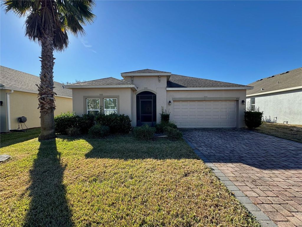 Photo of 215 Lakeshore Drive, Davenport, FL 33837 (MLS # O6375073)