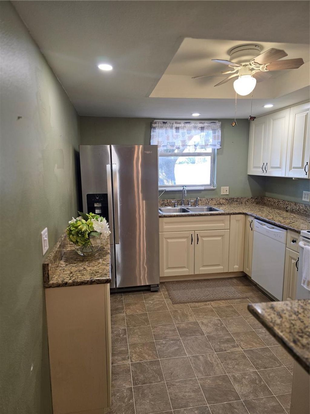 Photo of 4140 Passport Lane #101, New Port Richey, FL 34653 (MLS # W7883079)