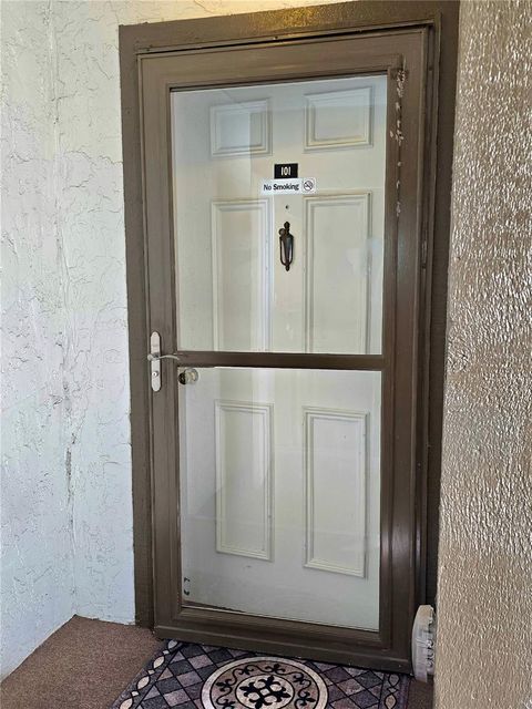 Photo of 4140 Passport Lane #101, New Port Richey, FL 34653 (MLS # W7883079)