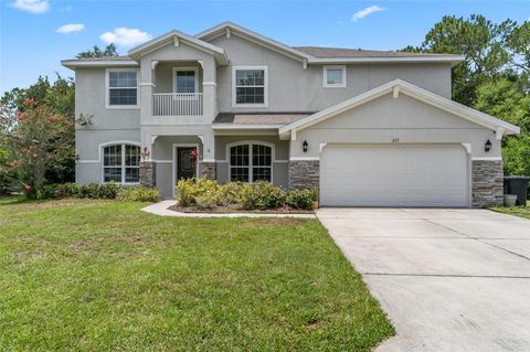 Photo of 227 Birchwood Drive, Palm Coast, FL 32137 (MLS # FC311125)