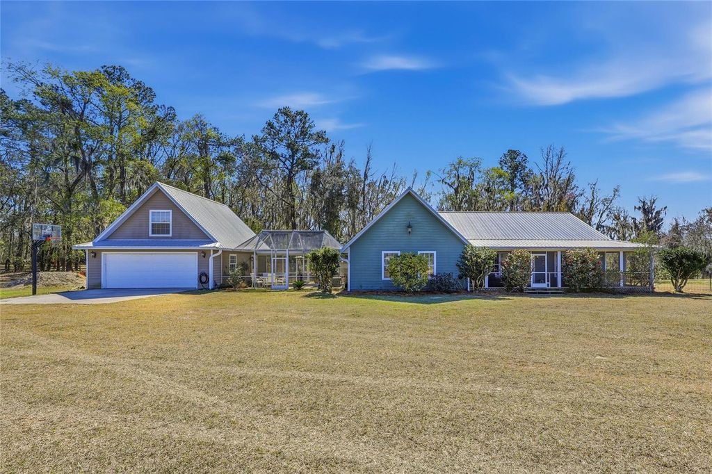 Photo of 27471 NW 173rd Terrace, Alachua, FL 32615 (MLS # GC537361)