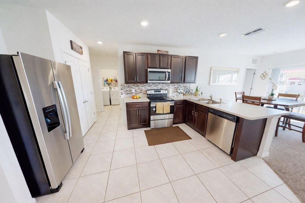 Photo of 452 Burnham Circle, Auburndale, FL 33823 (MLS # TB8471695)