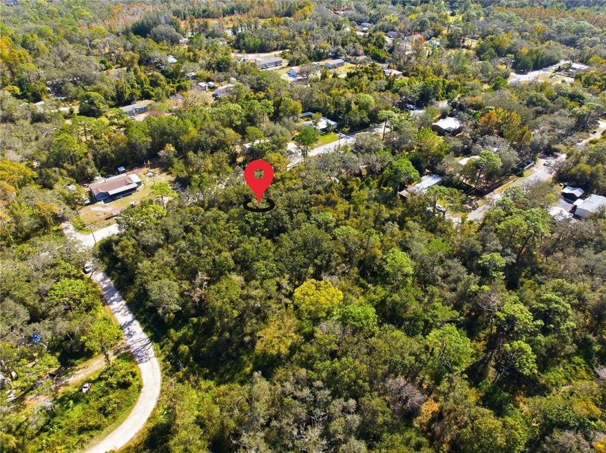 Discover this high and dry 0.27-acre residential parcel located on quiet Shalimar Street in the Moon Lake Estates area of New Port Richey. Nestled in a peaceful, established neighborhood, this lot offers a blend of privacy, convenience, and growth potential—perfect for your next custom home or investment hold. This FEMA Zone X property means no flood insurance required, with approximate dimensions of 109x106x108x105 ft, offering plenty of room for your build, landscaping, or outdoor retreat. Zoned SFR, ready for a single-family residence with electric utilities nearby and paved road access. Situated in Pasco County, you’ll enjoy proximity to:     •Shopping & Dining: Ridge Road corridor, US-19, and SR-52 just minutes away     •Outdoor Recreation: Starkey Wilderness Park, Jay B. Starkey Trail, and Sims Park along the Cotee River     •Beaches & Boating: 25–30 minutes to Fred Howard Park, Anclote River Park, and Tarpon Springs Sponge Docks     •Travel Made Easy: About 40 miles (~45 minutes) to Tampa International Airport (TPA)     •    & enjoy Convenient Access: Nearby schools, healthcare facilities, and the growing Trinity/New Port Richey corridor. Go and show — & Submit your offer today