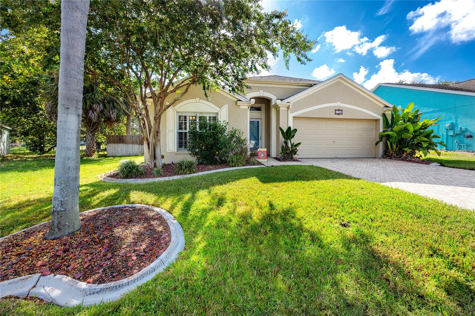Experience the perfect blend of Florida charm, modern convenience, and resort-style living in this beautifully maintained 3-bedroom, 2-bath pool home located in the highly desirable Beckett Bay community of Tarpon Springs. Nestled just minutes from the Anclote River, Fred Howard Park, and the world-famous Tarpon Springs Sponge Docks, this home offers not only a quiet neighborhood setting but also close proximity to Gulf Coast beaches, waterfront dining, and walkable outdoor attractions.
Step inside to an open, airy layout featuring high ceilings, updated vinyl plank flooring, and plantation shutters throughout. The spacious living and dining rooms overlook your private screened-in pool area—perfect for entertaining, relaxing, or enjoying BBQs with family and friends. The backyard is fully fenced for your pets and includes a generous lawn, brick-paved patio with birdcage enclosure, fire pit, and room to garden, play, or create your own outdoor retreat.
The split-bedroom floor plan offers privacy, with a large primary suite that includes a walk-in closet, ensuite bathroom with a soaking tub and separate shower, and peaceful views of the pool area. The kitchen features modern appliances, new microwave and refrigerator, and a convenient layout ideal for everyday living. A full-sized washer and dryer, utility sink, and plenty of storage space are located in the spacious 2-car garage with high-quality epoxy-coated floors and a brick-paved driveway for added curb appeal.
Beckett Bay is a family-friendly neighborhood that offers access to community amenities including a pool, tennis courts, and basketball courts—all within walking distance. You’re also just a short stroll to North Anclote River Nature Park, with its scenic trails, playground, and picnic areas.
Whether you’re searching for a primary residence, a seasonal retreat, or a move-in ready pool home near the water, this property checks all the boxes. Schedule your private showing today and experience the Florida lifestyle you’ve been waiting for! Property has an assumable loan, please reach out for more information on loan details today.